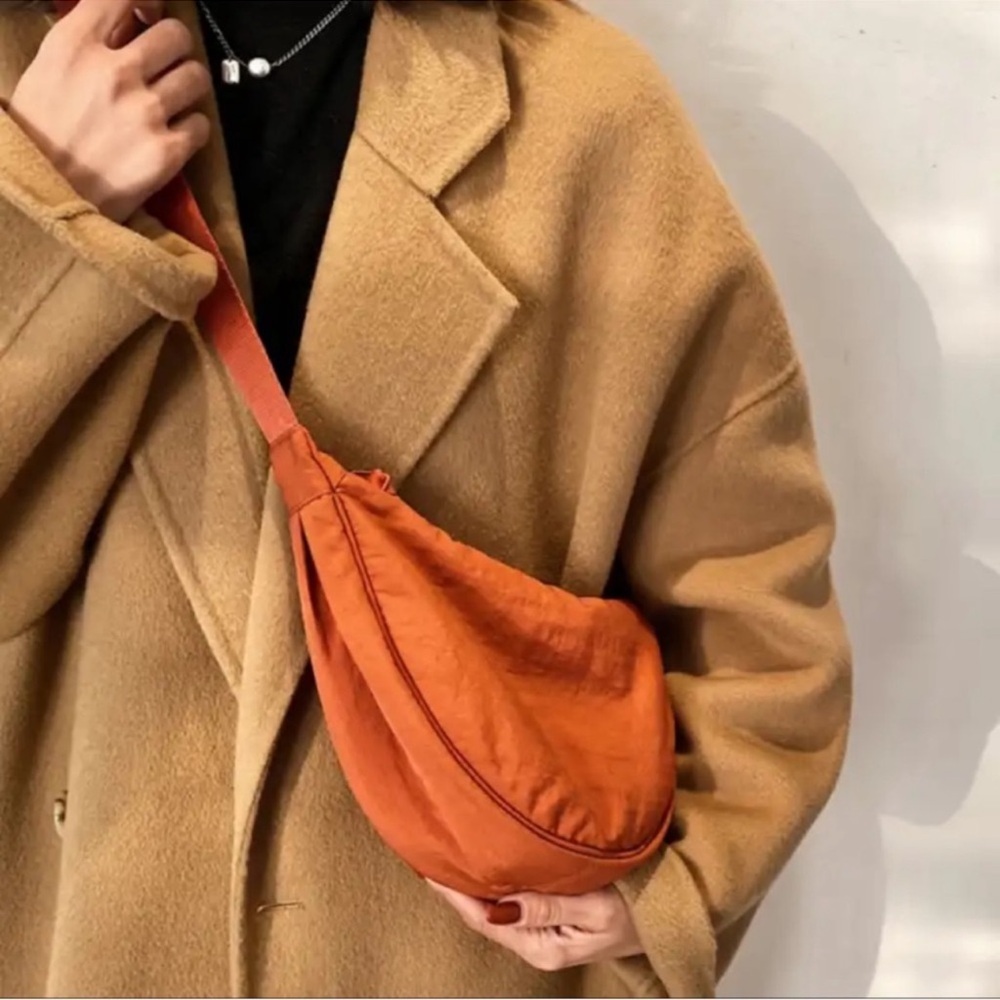 Uniqlo Japan viral dumpling crescent croissant orange rust moon nylon crossbody